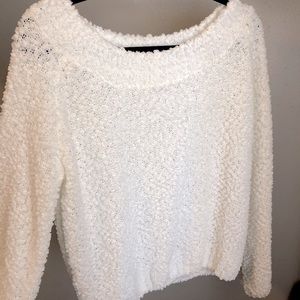 Soft, white, knit off the shoulder sweater